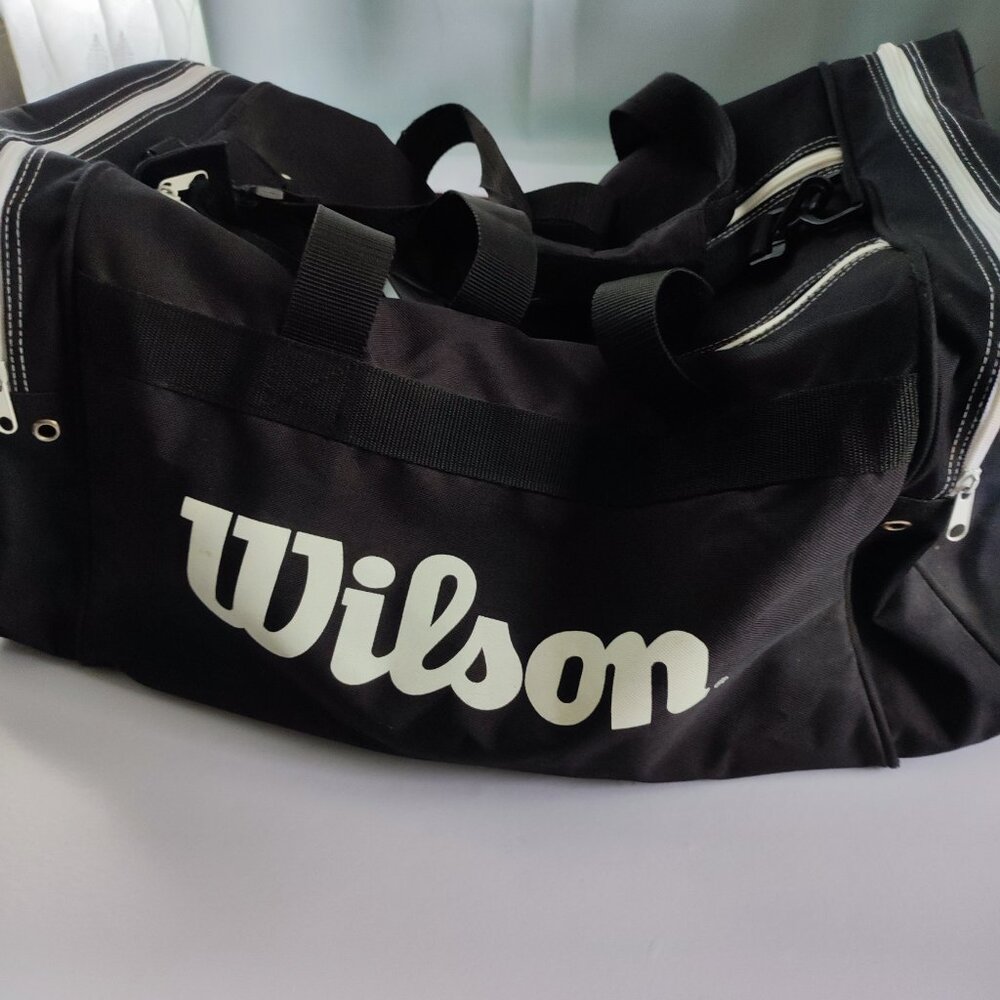 Wilson duffel bag black L 23" / W 11" / H 11" hand & shoulder straps